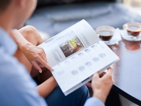 A man reading an information booklet