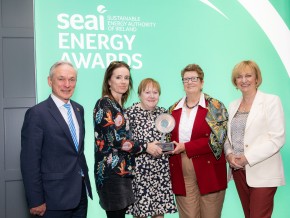 Award winners posing with her award at the SEAI energy awards