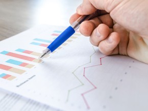 Printed sheet of statistics and graphs