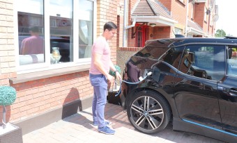 Keith charging his electric car