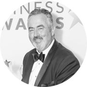 A profile photo of energy show speaker Ian McGuinness