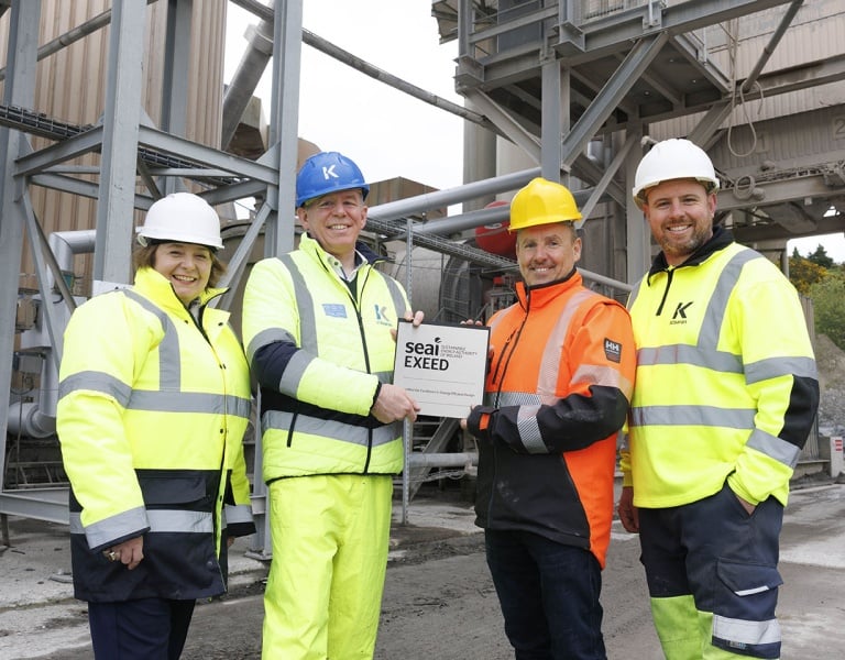 Team at Kilsaran receiving their EXEED certification plaque