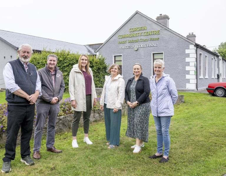 Members of the Corofin SEC standing outside the community centre.
