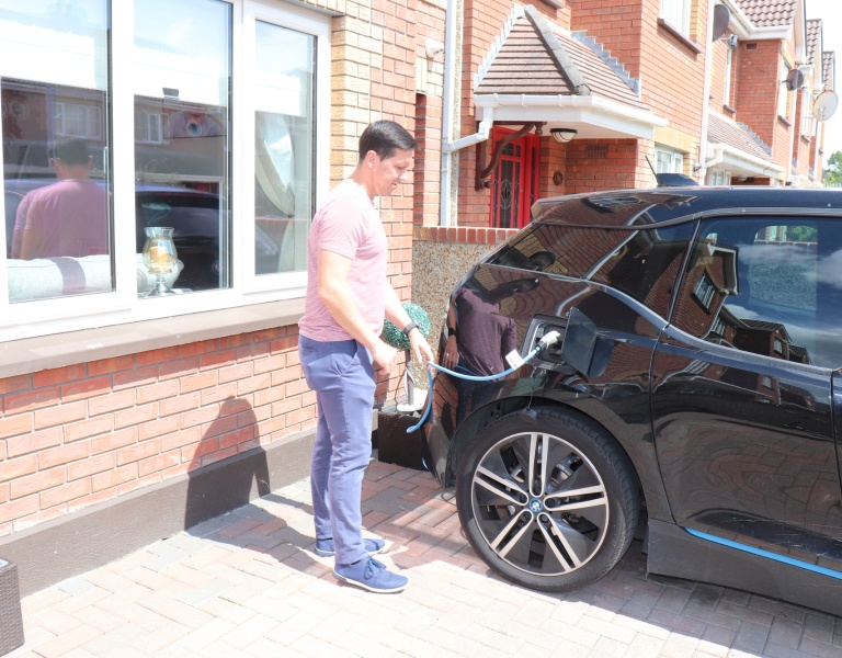 Keith charging his electric car