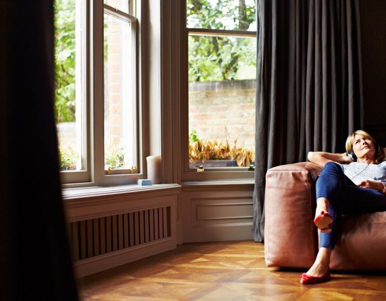 Woman relaxing in her home