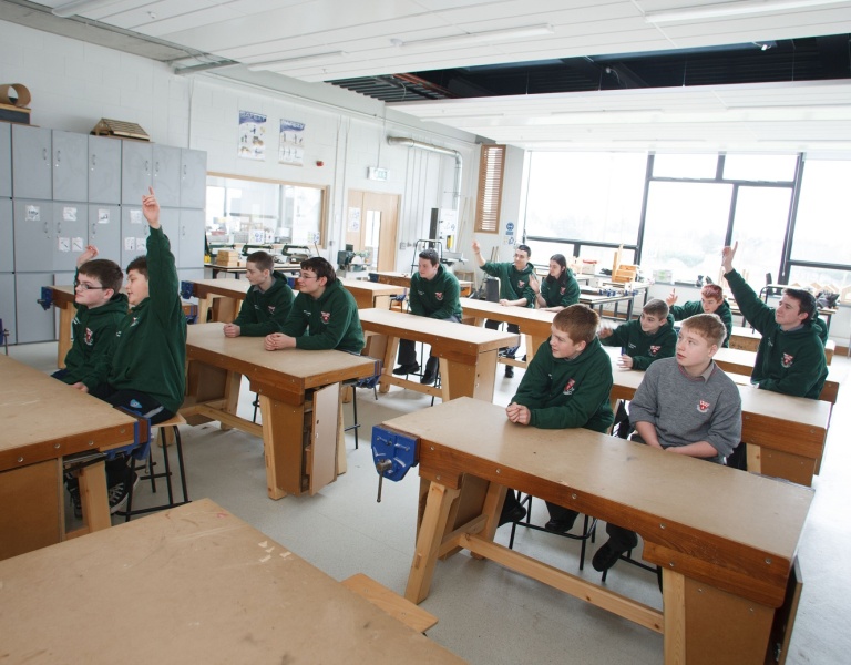 Children in a classroom participating in a lesson
