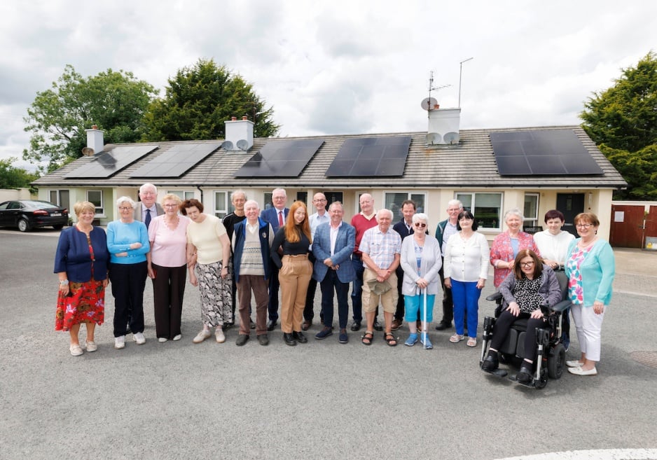 A group photo taken at a housing estate
