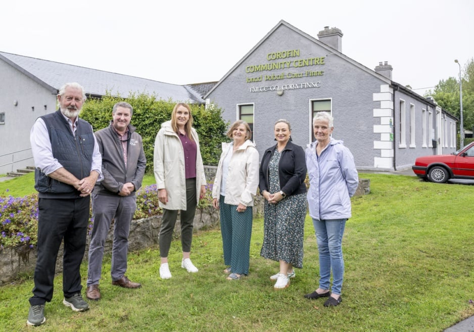 Members of the Corofin SEC standing outside the community centre.