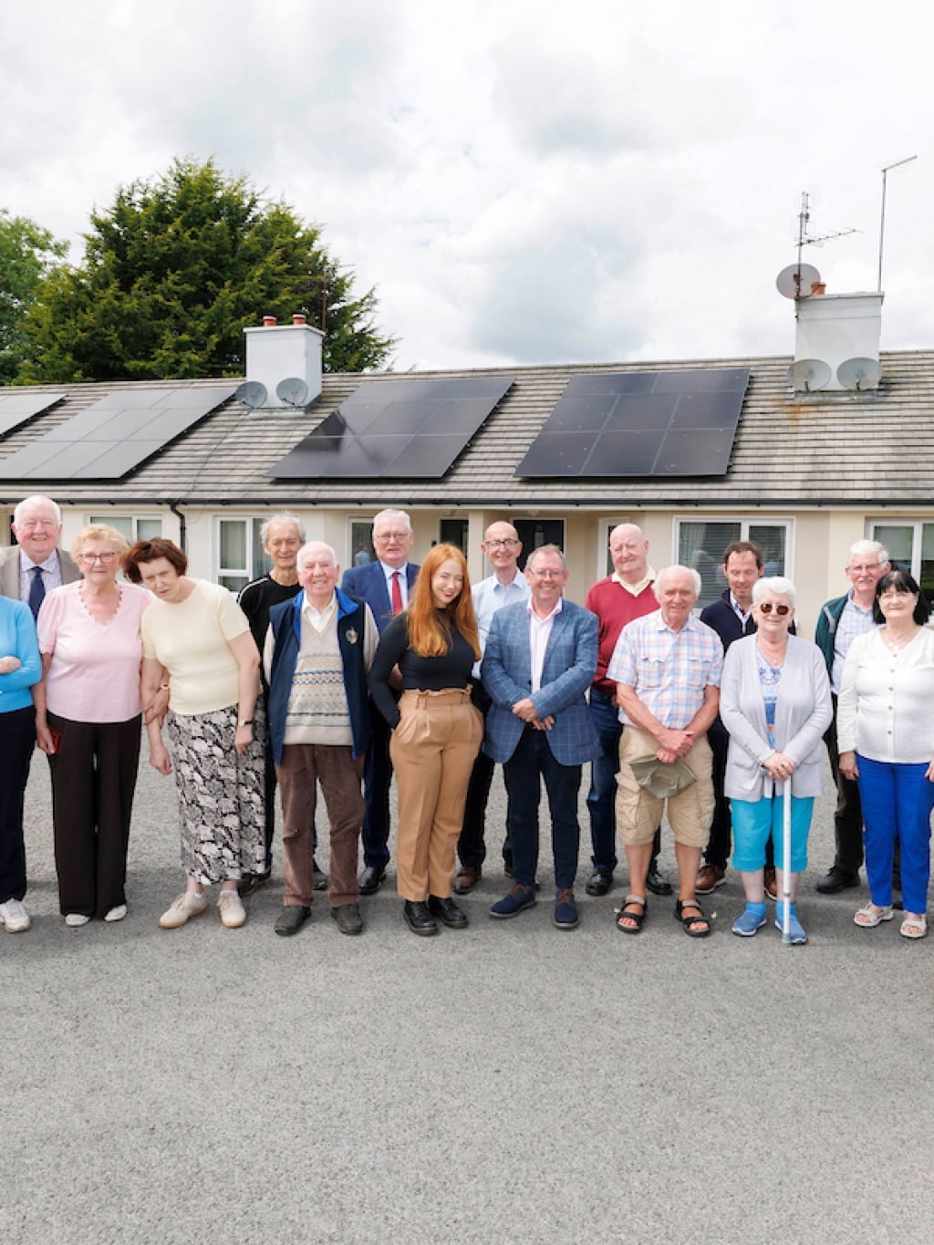 A group photo taken at a housing estate