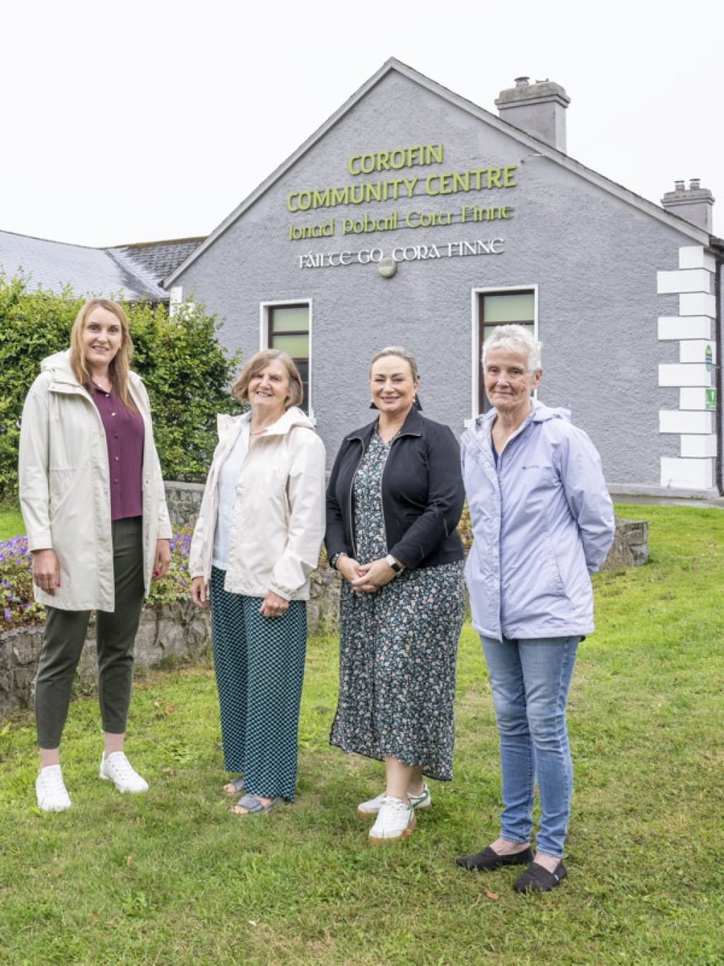 Members of the Corofin SEC standing outside the community centre.