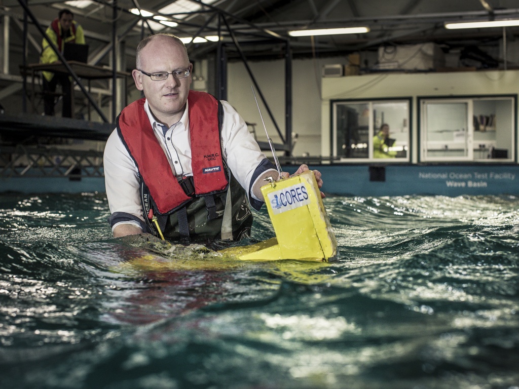 a man conducting ocean energy research in a pool
