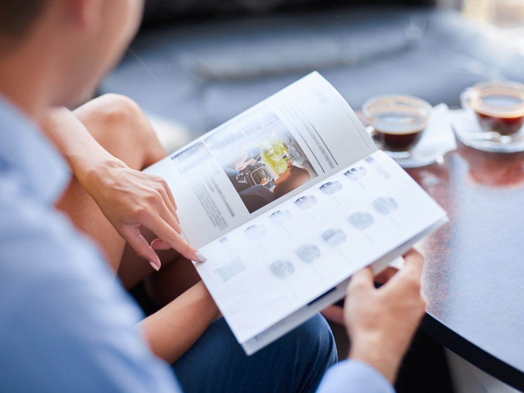 A man reading an information booklet